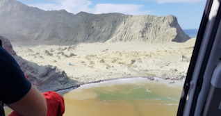 Tremors worsen on New Zealand volcano island, prevent recovery efforts
