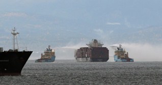 Container fire on cargo ship near Victoria mostly under control