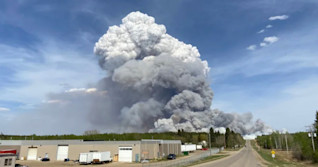 Prince Albert issues partial evacuation order as forest burns nearby