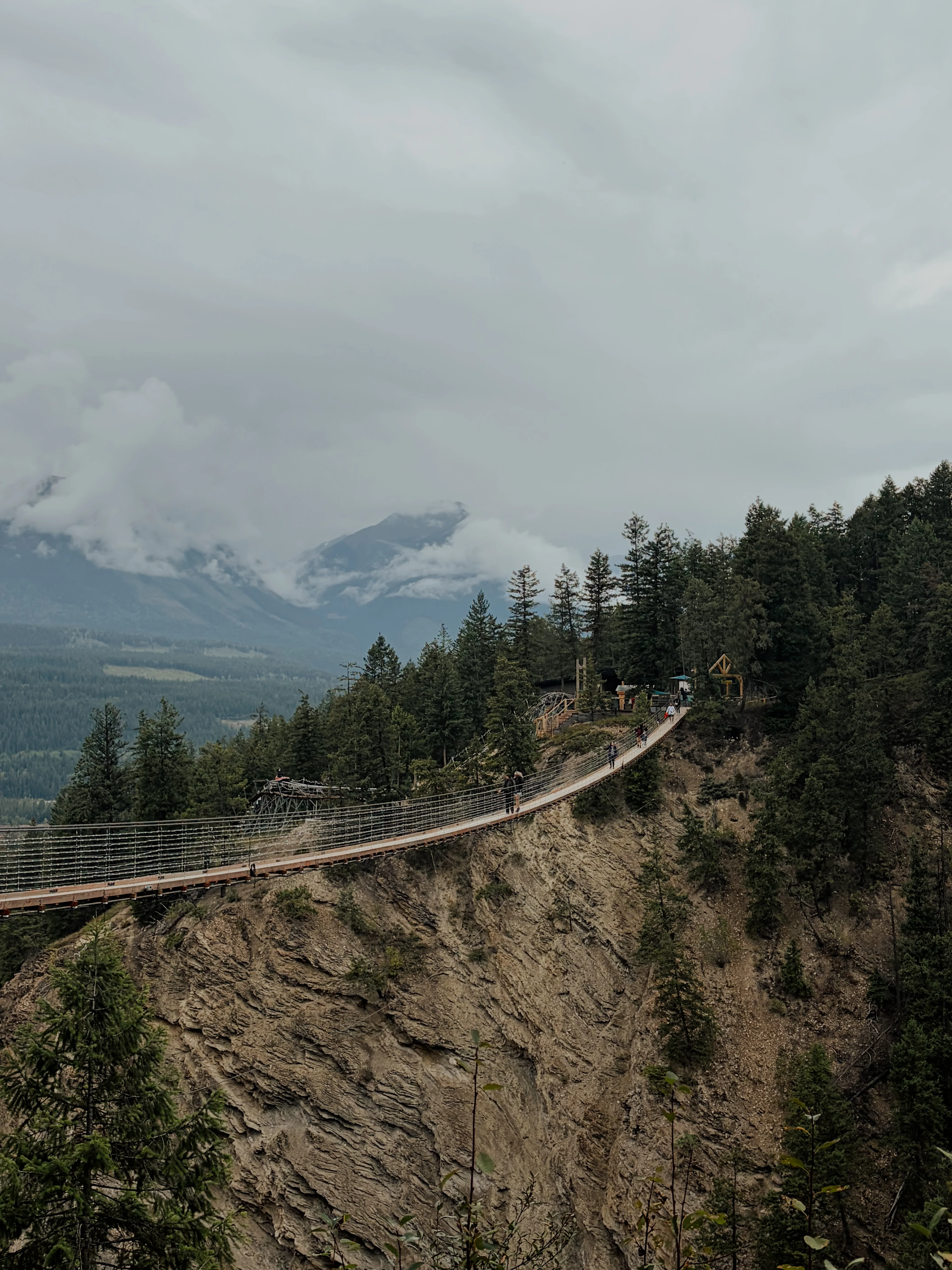 A long suspension bridge high above the Rockies. (Mia Gordon/TWN)