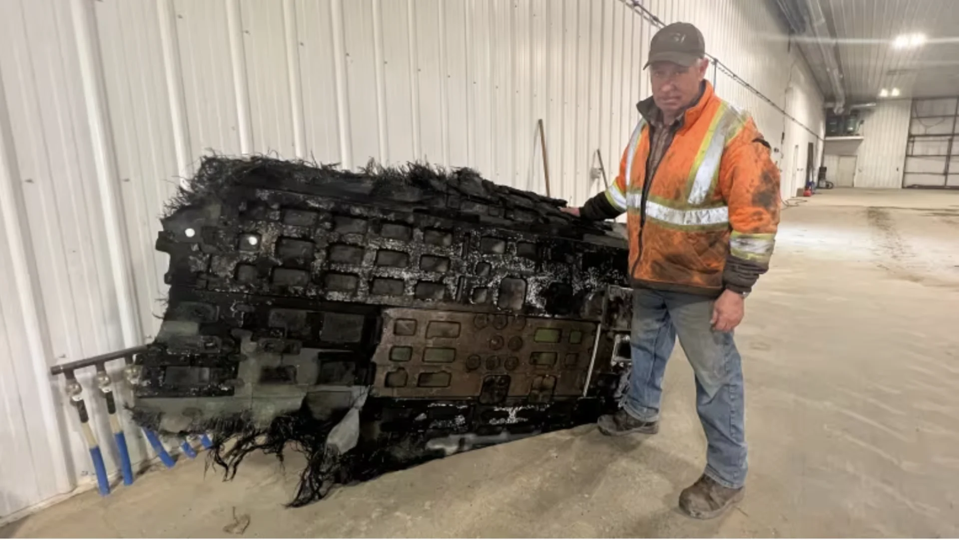 CBC: Saskatchewan farmer Barry Sawchuk recently discovered this 40-kilogram piece of space debris on his land. He plans to sell it to raise money for his local hockey rink. (Adam Bent/CBC)