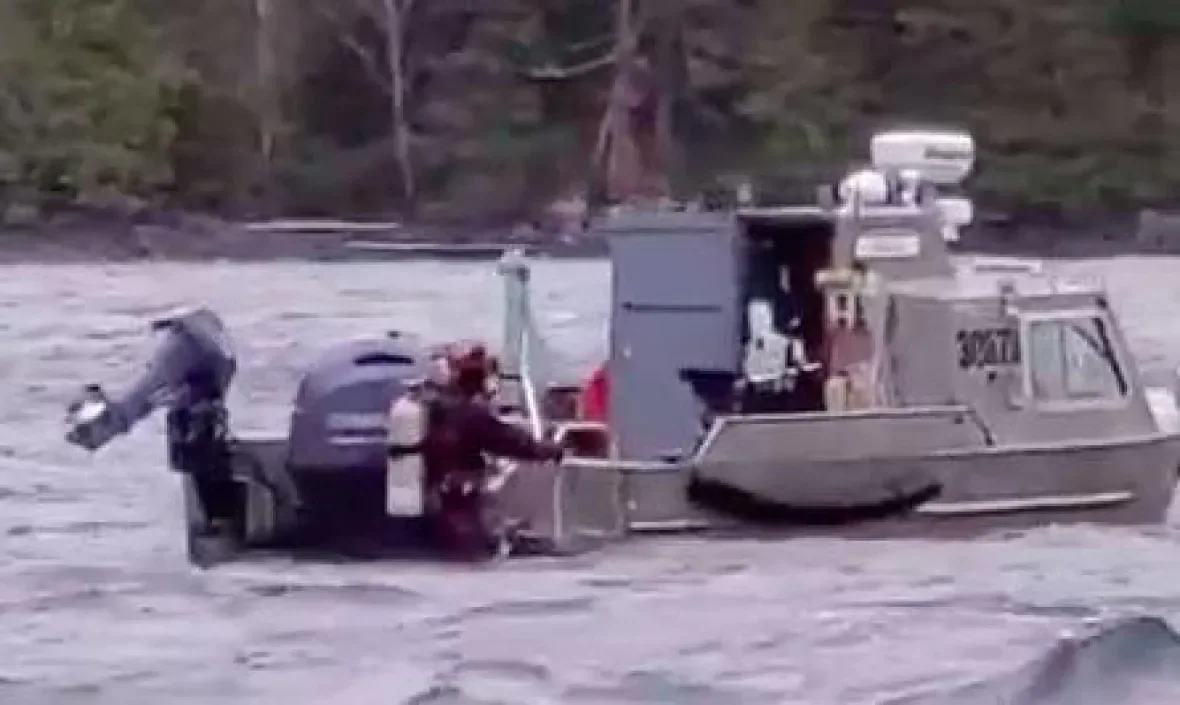 diver-on-boat/Hiwaas Henry William Clifton Jr./Facebook via CBC