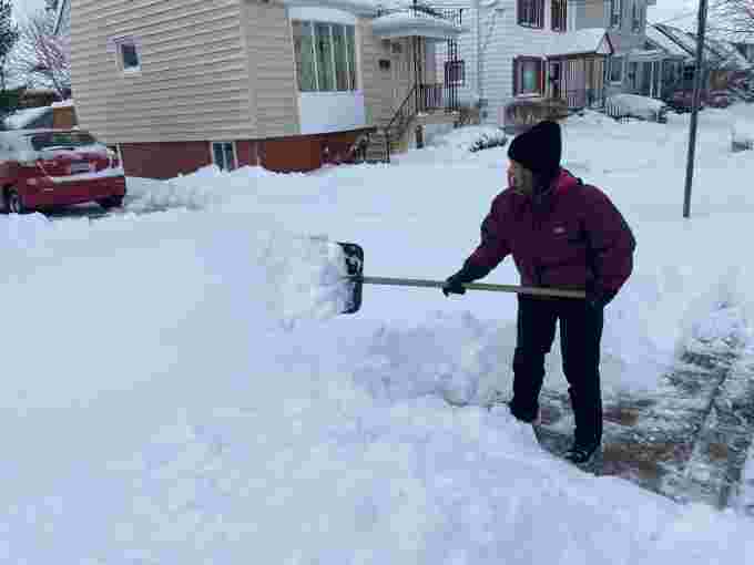 Nathan Coleman: Woman seen shovelling snow in Halifax Thursday morning on Dec. 9, 2021. 