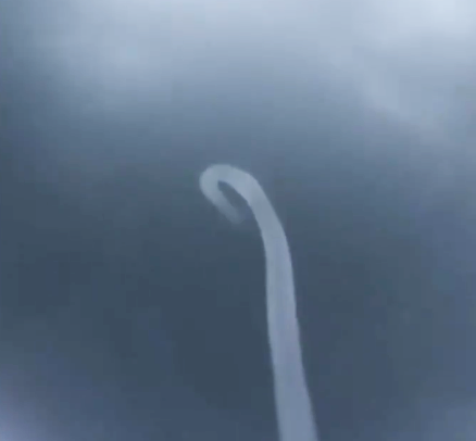 Bizarre: Waterspout looks like an umbilical cord in the sky