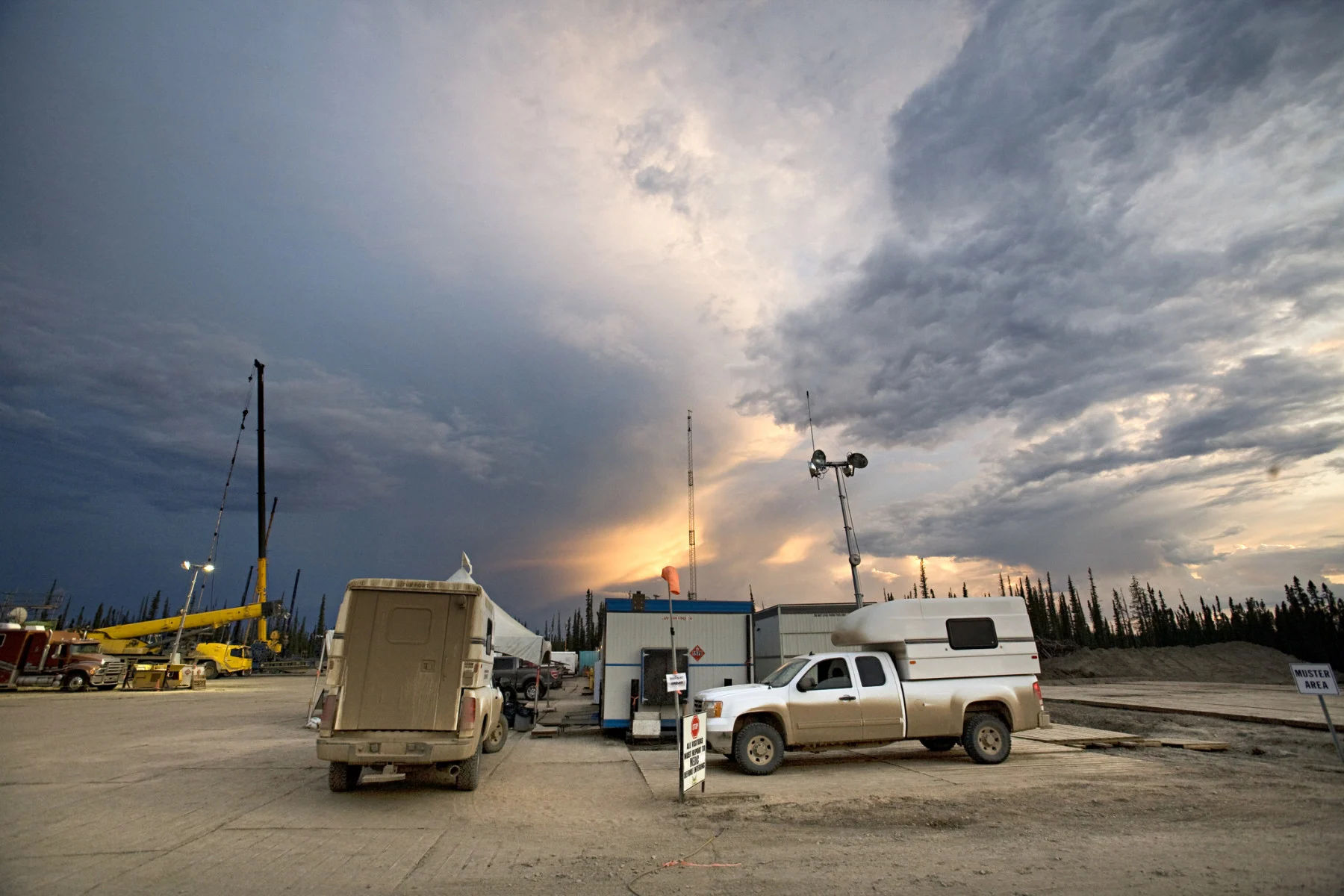 Medic trucks at entrance of fracking site, Northern British Columbia, Canada. (Aaron Black/ The Image Bank/ Getty Images)