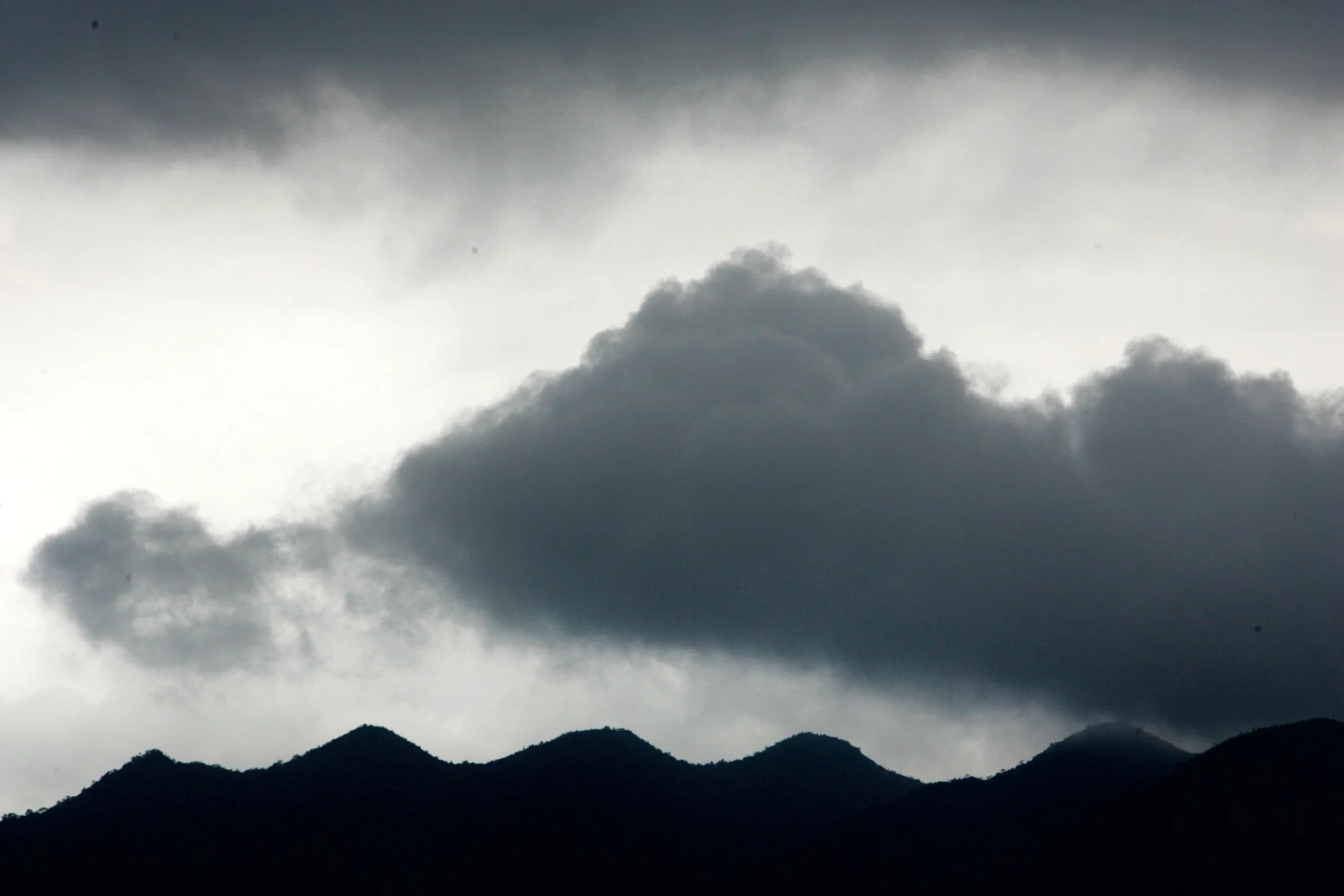 REUTERS- Dark clouds China-s Guangdong province - File Photo