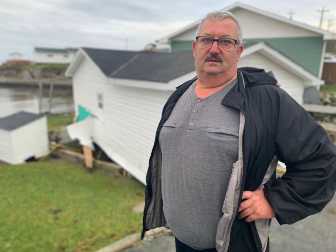 One of Derek Kettle's apartment buildings on Mouse Island in Port aux Basques was lifted off its foundation by storm surge generated by post-tropical storm Fiona. (Malone Mullin/CBC)