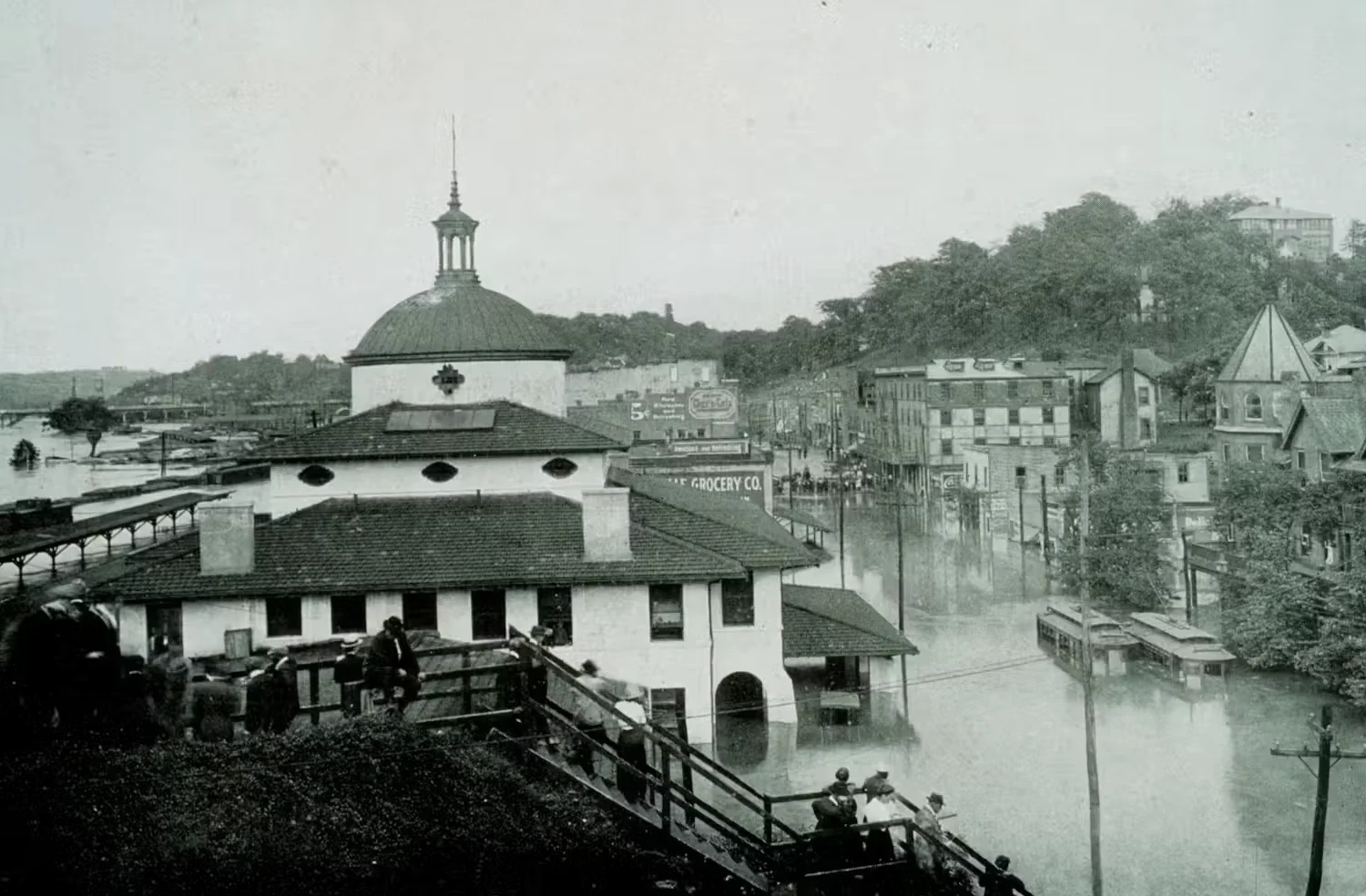 NOAA: Back-to-back tropical cyclones in 1916 left businesses in Asheville, N.C., surrounded by floodwater. Archival Photography by Steve Nicklas via NOAA