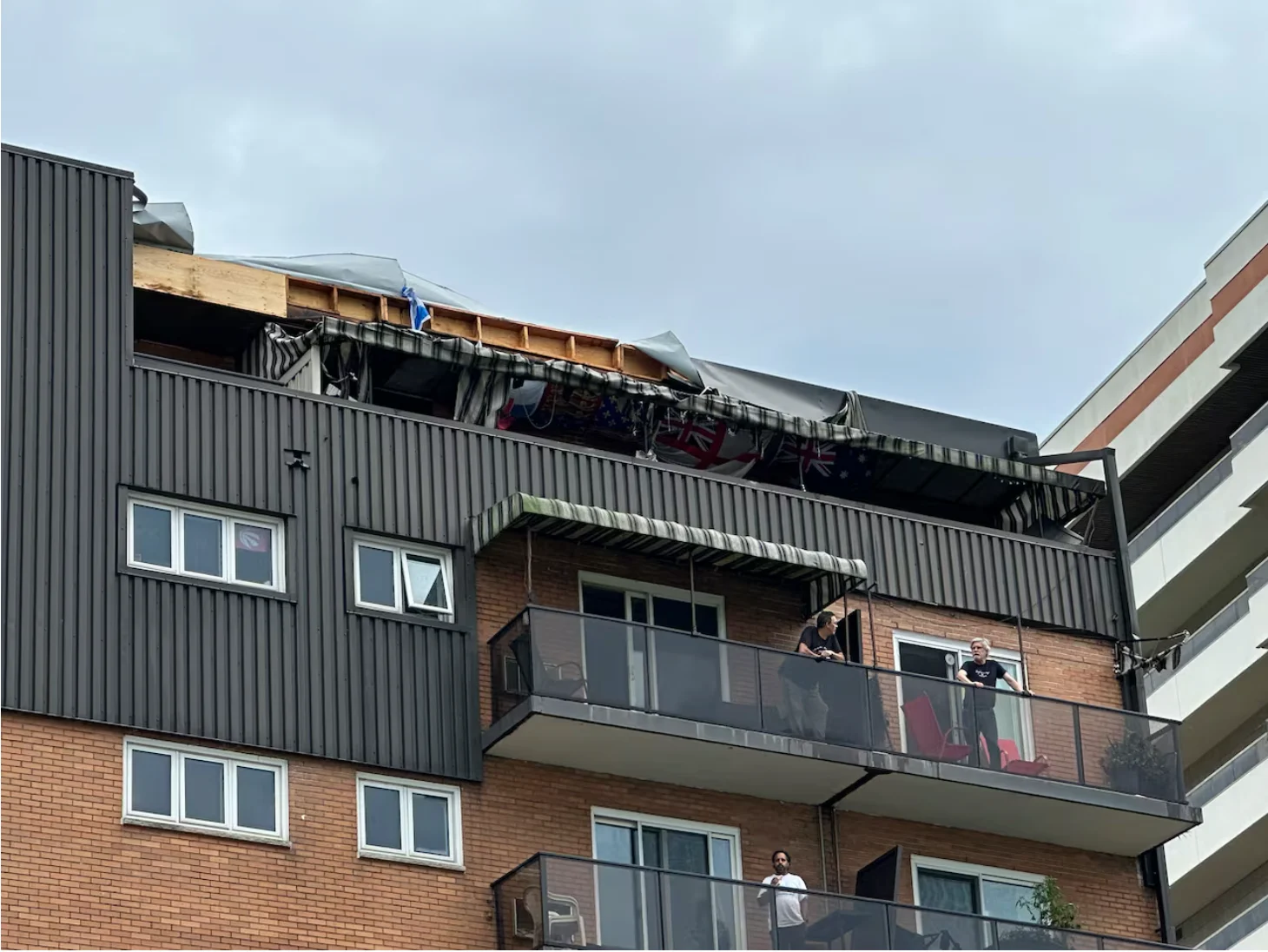 CBC: The roof was torn off this apartment on Riverside Drive East at Buckingham Drive after a tornado ripped through the neighbourhood. (Dalson Chen/CBC)