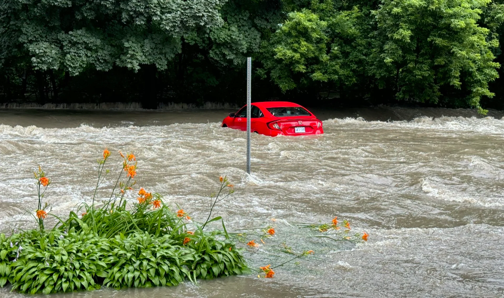 PHOTOS: Major flooding prompts road closures, power outages in Ontario ...