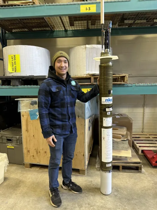 CBC: The ONC's Albert Ruskey with a Argo float, deep-sea droids that collect vital ocean data while travelling up and down in the space between the sea surface and the seafloor. (Ocean Networks Canada. )