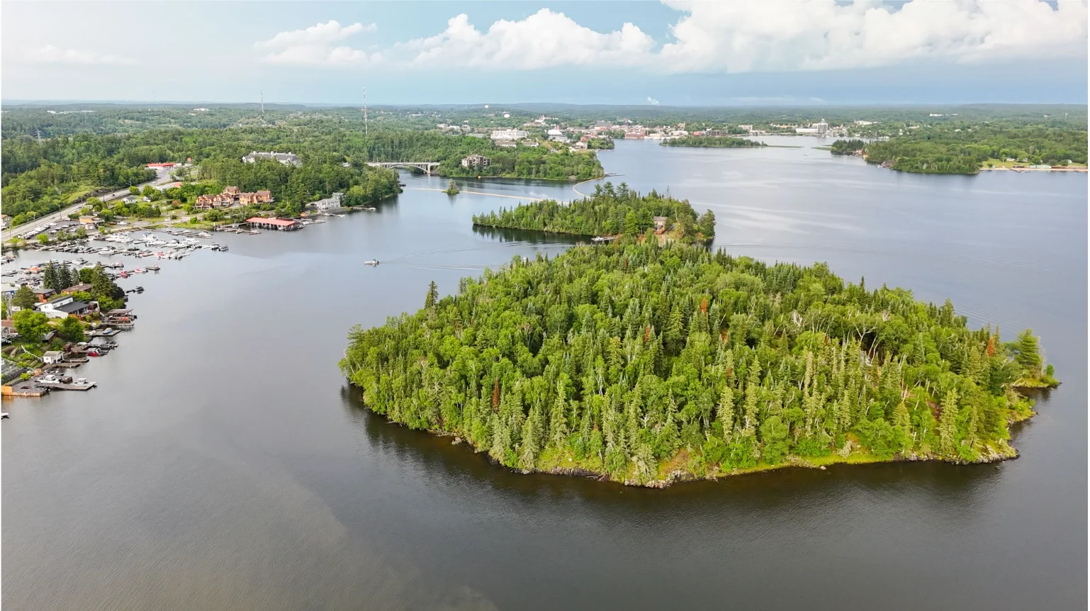No re-use: In Kenora, you can drink craft beer that has been aged through the winter at the bottom of Lake of the Woods (pictured above). (Credit: Discover Northern Ontario/Culinary Travel Alliance)