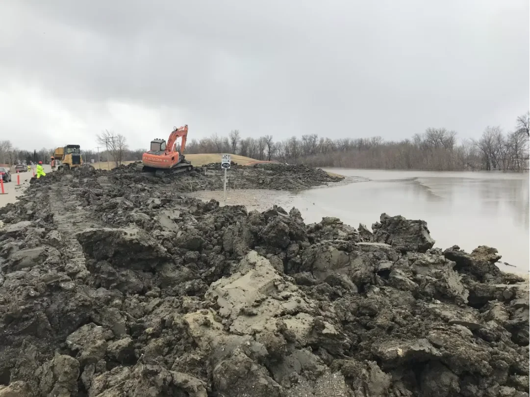 CBC: Crews built an emergency dike in St. Adolphe last April in preparation of the expected flood. The Red River is not projected to rise high enough to threaten any communities protected by ring dikes this spring, Manitoba flood forecasters say. (Thomas Asselin/CBC)