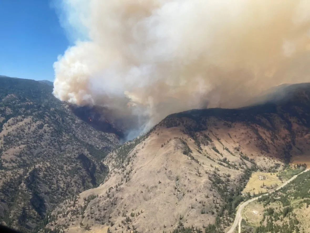 B.C.'s biggest wildfires remain stable, but heat and terrain spark worries