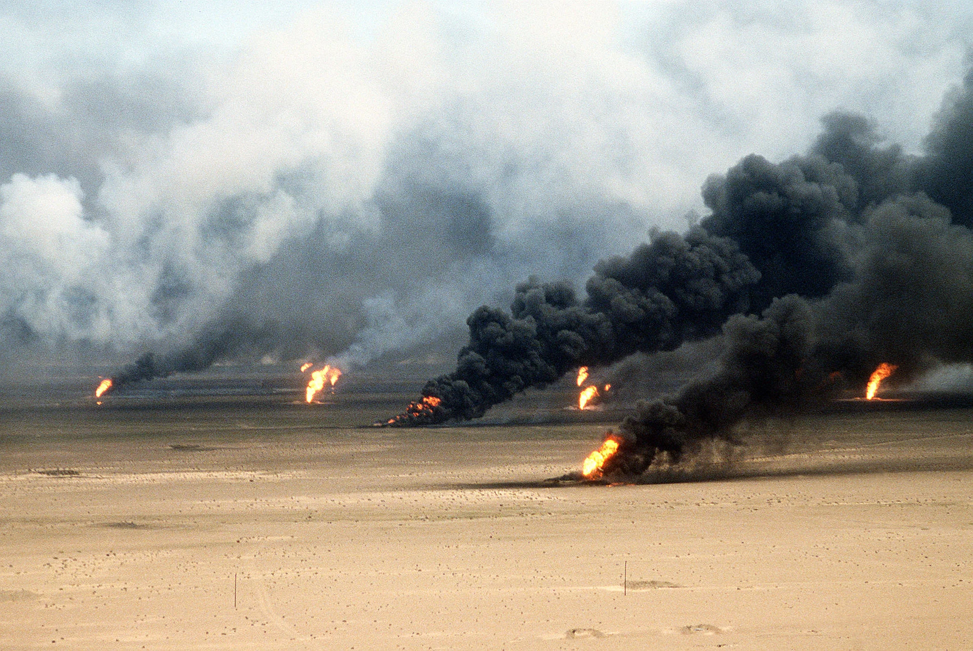 Oil well fires rage outside Kuwait City in 1991.