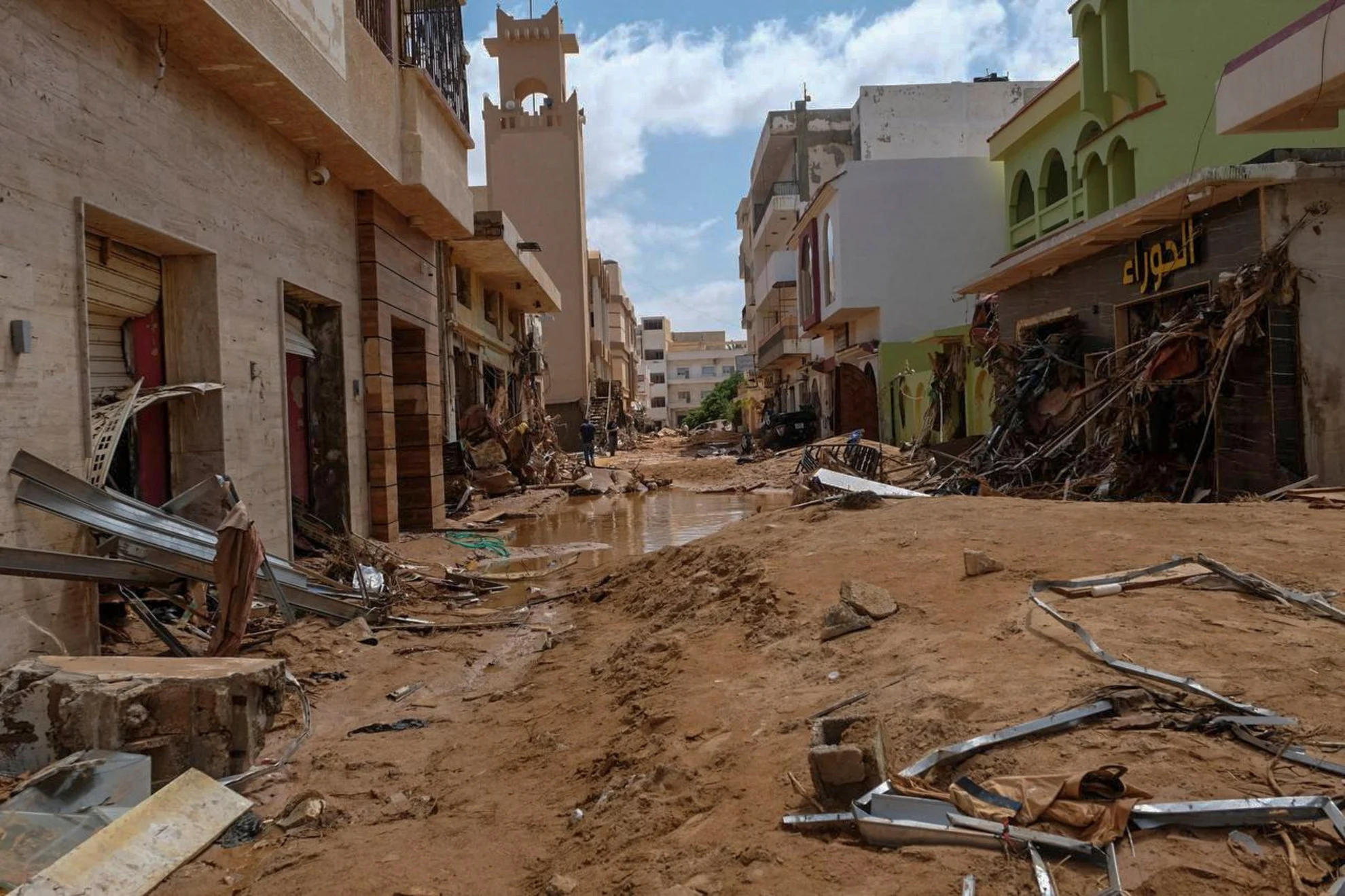 REUTERS: A view shows a damaged street, after a powerful storm and heavy rainfall hit Libya, in Derna, Libya September 12, 2023. REUTERS/Esam Omran Al-Fetori