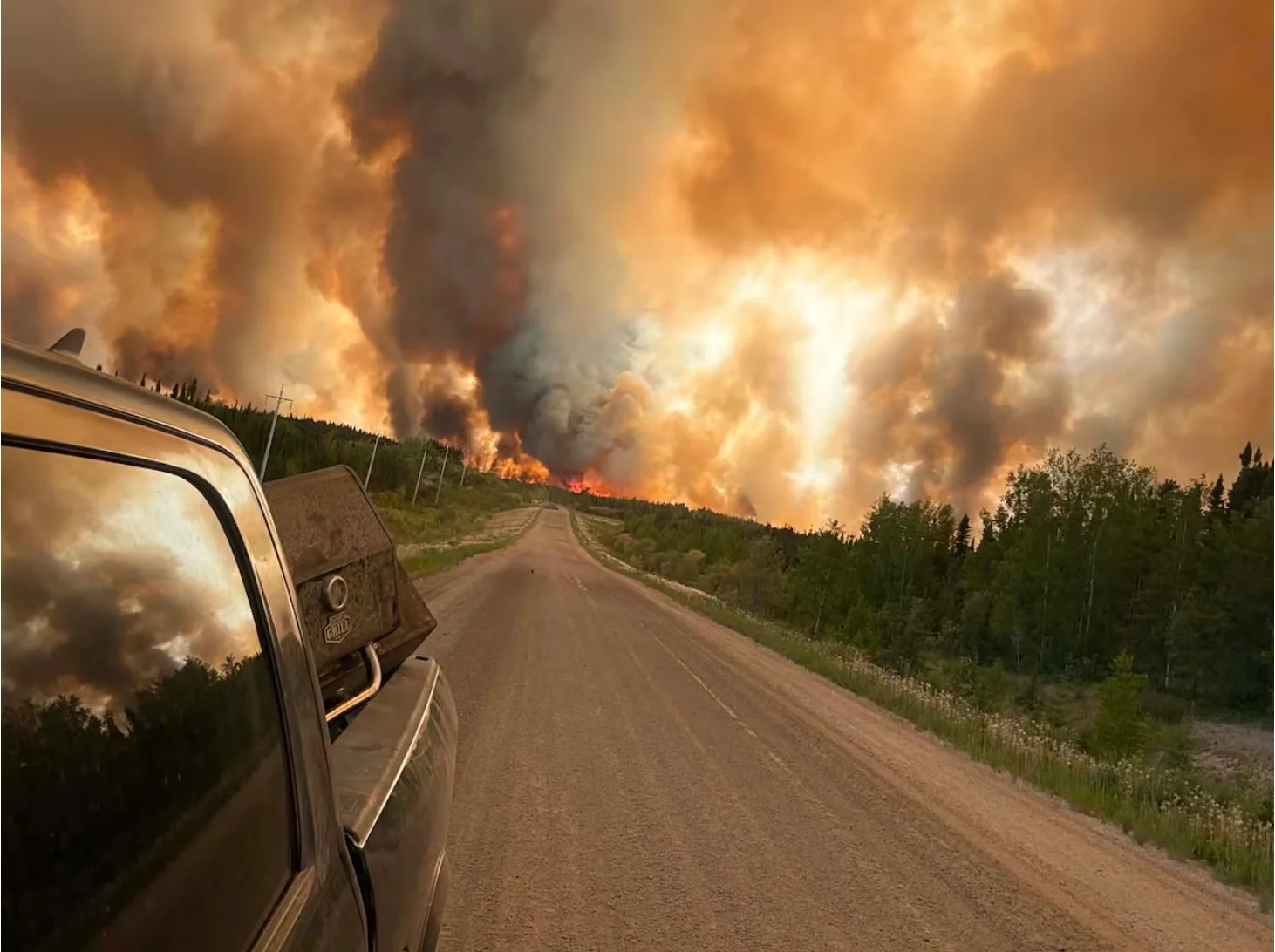 CBC: Photo of a fire near O-Pipon-Na-Piwin Cree Nation Saturday. About a hundred vulnerable residents were being evacuated out the northern Manitoba First Nation Sunday. (Submitted by Susanna Thomas)