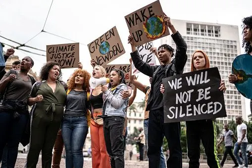 Protests holding signs during on a demonstration for environmentalism/FG Trade/Getty Images-1385767555-170667a