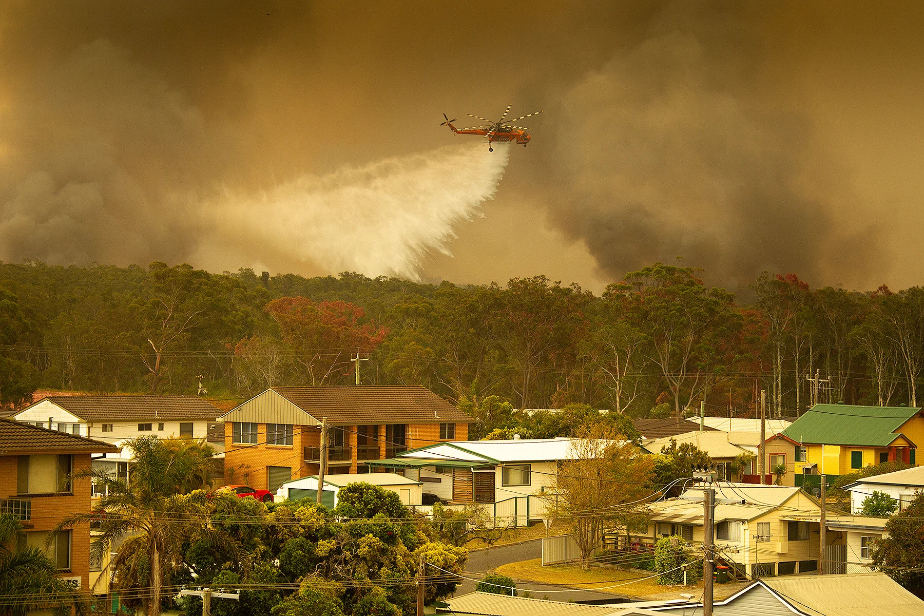 Australia water bomber helicopter Shane Chalkervia REUTERS