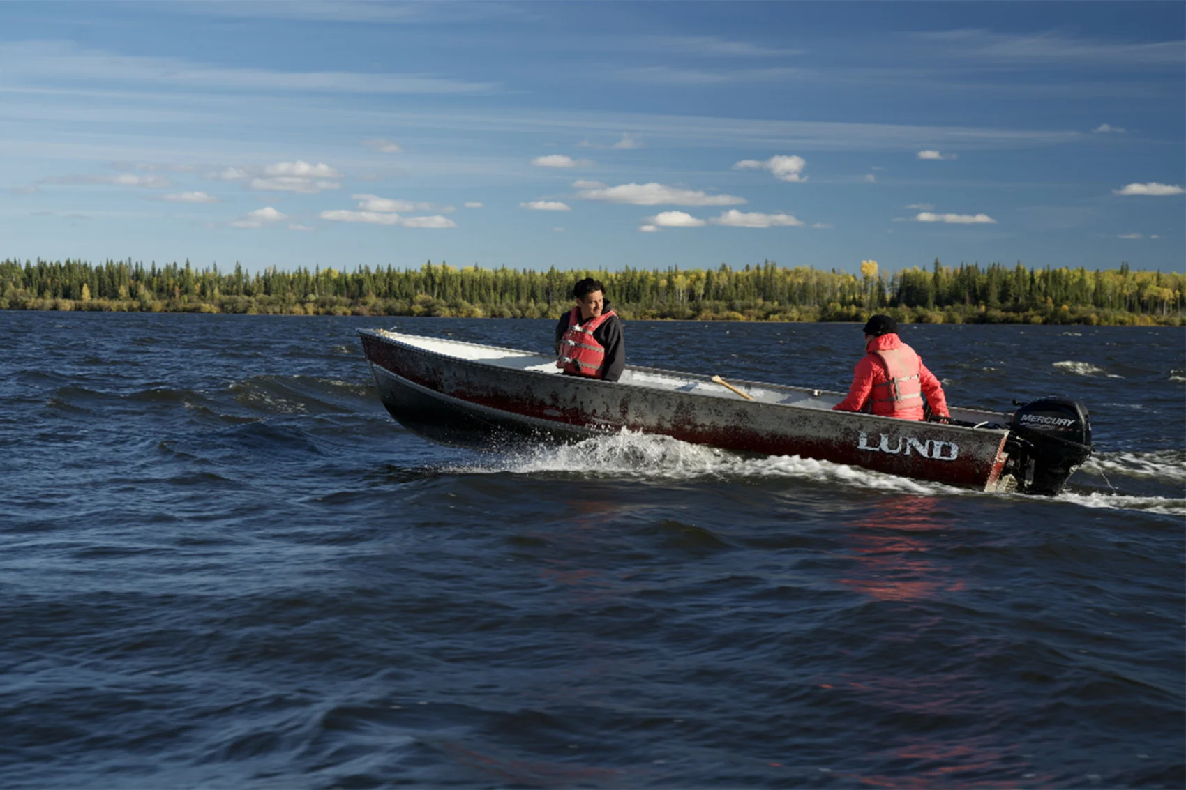 Matt Munson, a technician with the Dene Tha’ First Nation, out on Mbehcho (Bistcho) Lake. The lake is in the far reaches of northern Alberta, making it a remote reprieve for wildlife. Photo: Jeremy Williams / River Voices productions