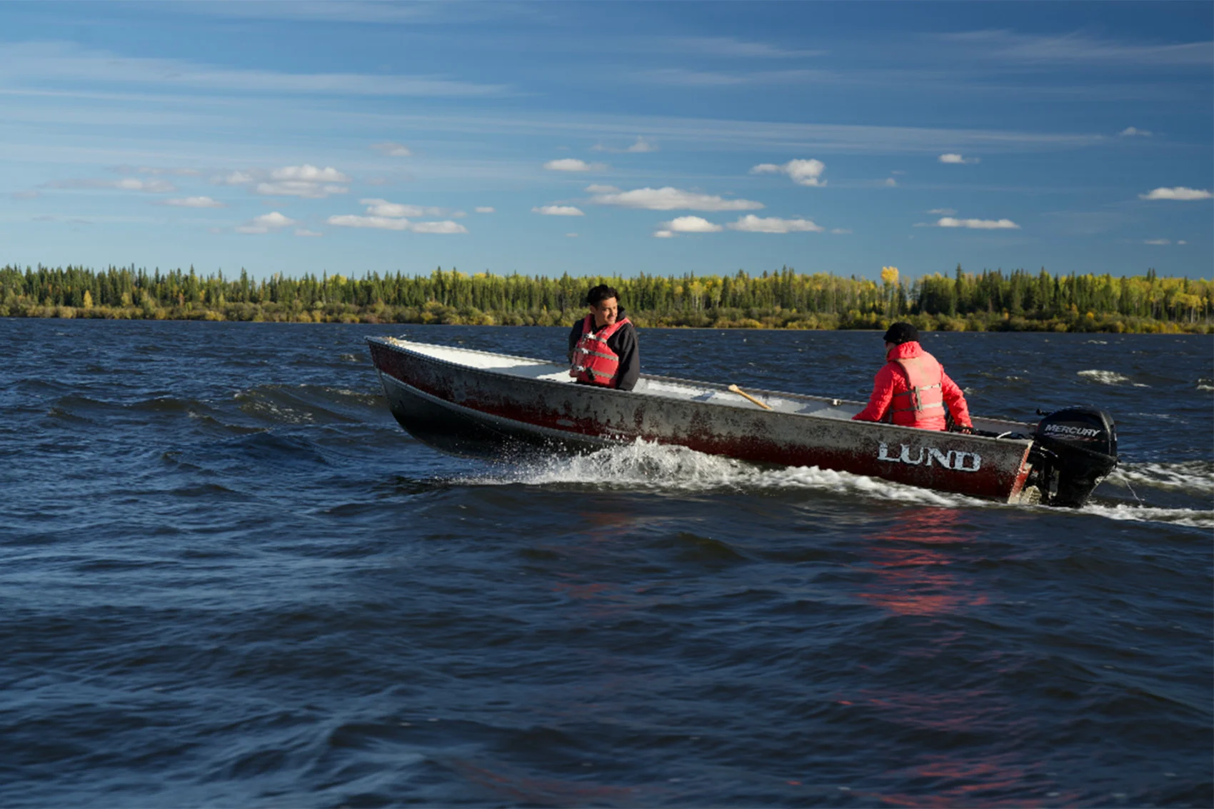 Matt Munson, a technician with the Dene Tha’ First Nation, out on Mbehcho (Bistcho) Lake. The lake is in the far reaches of northern Alberta, making it a remote reprieve for wildlife. Photo: Jeremy Williams / River Voices productions