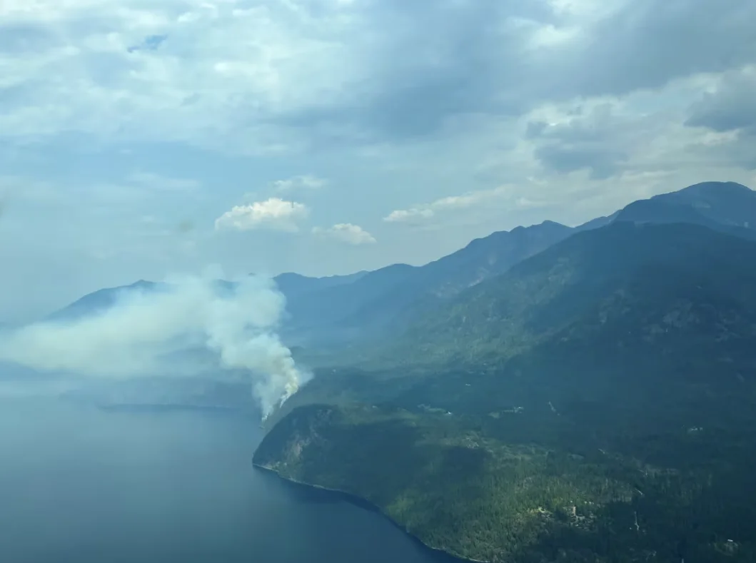 CBC: The Aylwin Creek wildfire is seen burning just west of Highway 6 in B.C.'s southeast on July 18, 2024. (B.C. Wildfire Service)