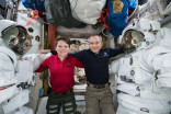 Canadian astronaut goes outside ISS on his first spacewalk