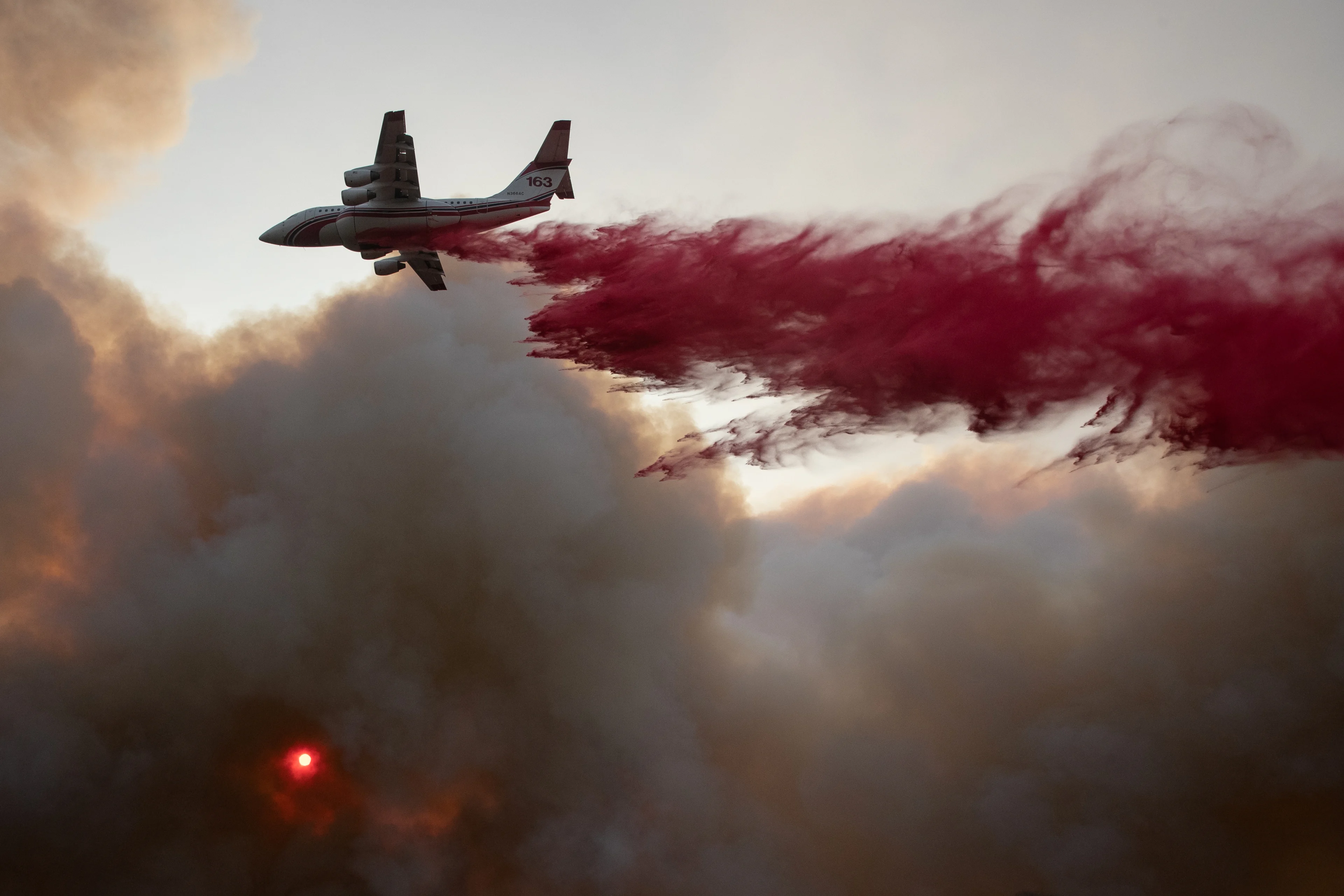 Reuters wildfire water bomber