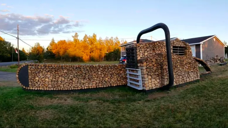 CBC woodpile sculpture chainsaw