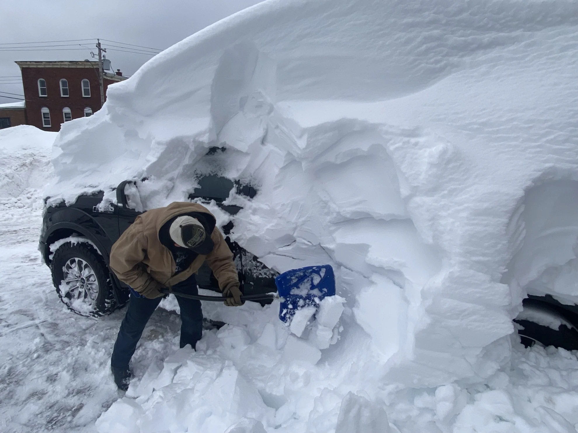 Car trapped beneath a heap of snow? Try these techniques before calling a tow