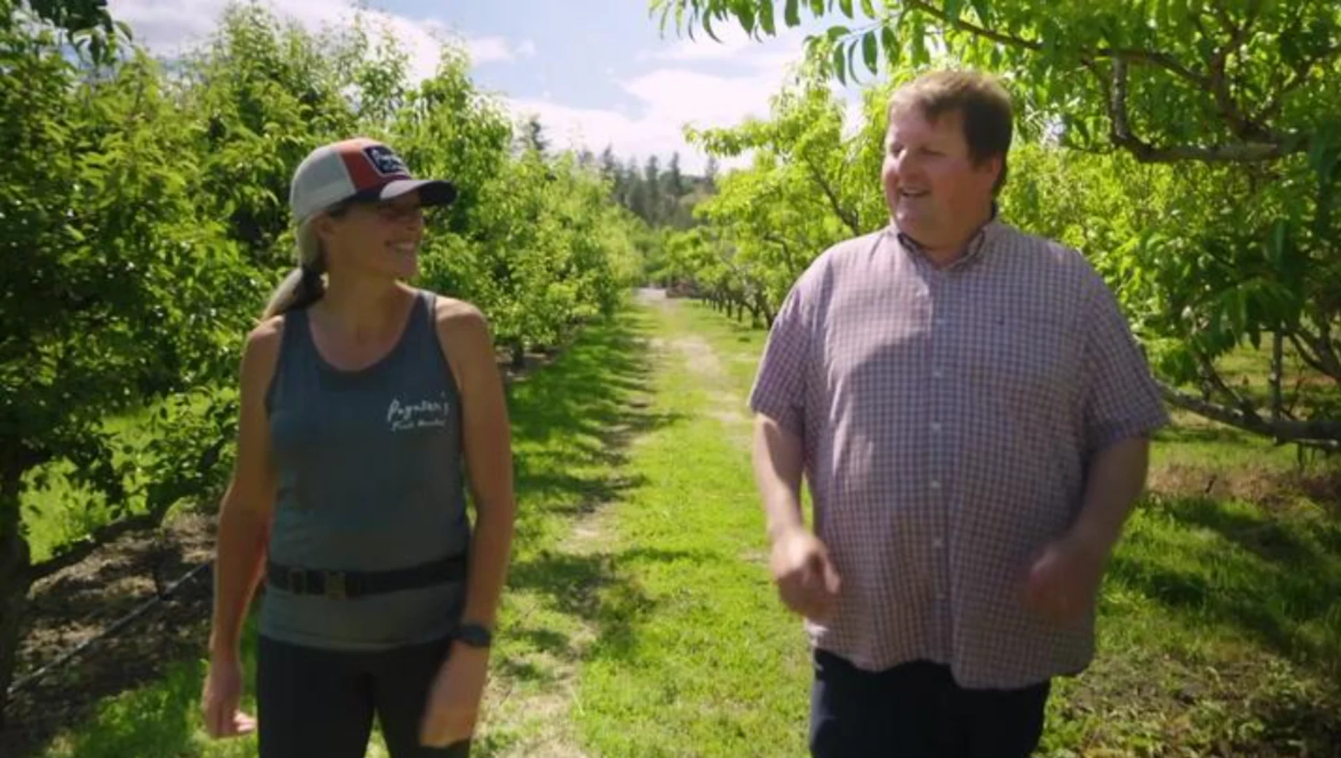 Credit: The Weather Network. Host Nathan Coleman with Jennay Oliver, Owner of Paytner’s Fruit Market touring Paytner’s Farm.