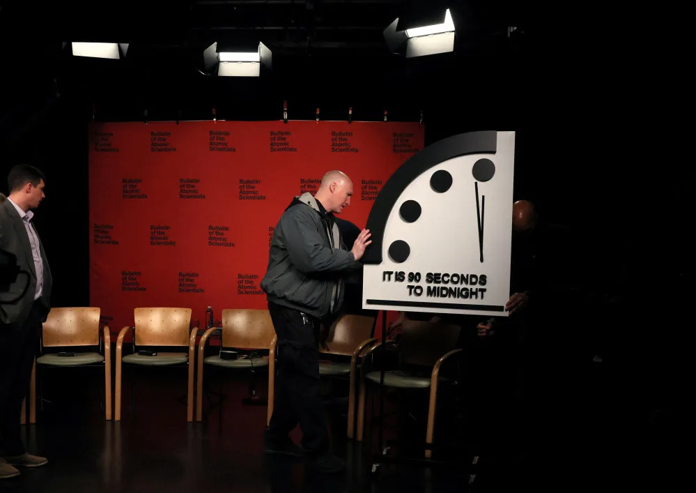 REUTERS: The clock with the Bulletin of the Atomic Scientists is being placed at a TV studio ahead of the announcement of the location of the minute hand on its Doomsday Clock, indicating what world developments mean for the perceived likelihood of nuclear catastrophe, at the National Press Club in Washington, U.S., January 24, 2023. REUTERS/Leah Millis