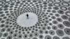 Tide threatens renowned sand artist's massive installation in B.C.