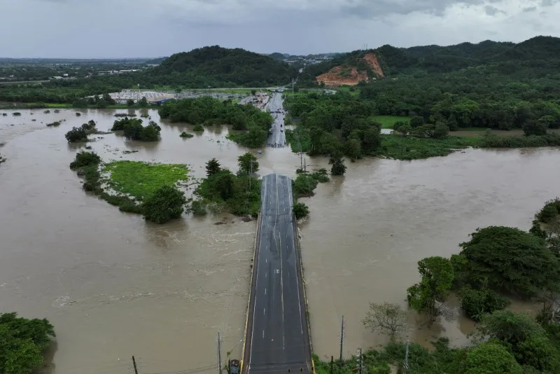 Reuters- Bridge submerged with Ernesto in Puerto Rico