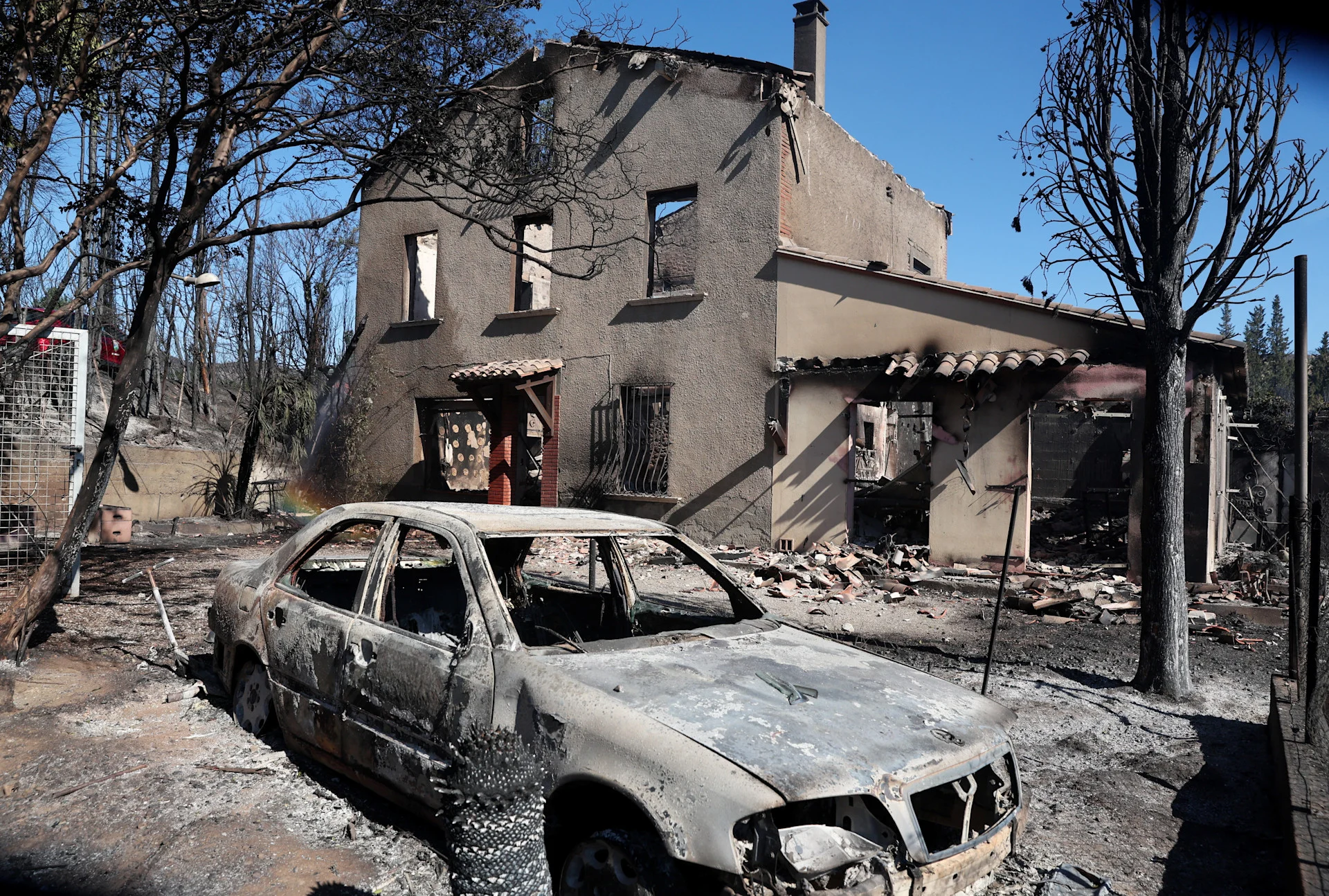 Reuters: A view of a burnt house following a wildfire in Ille-sur-Tet near Perpignan, France, July 6, 2026. REUTERS/Bruna Casas