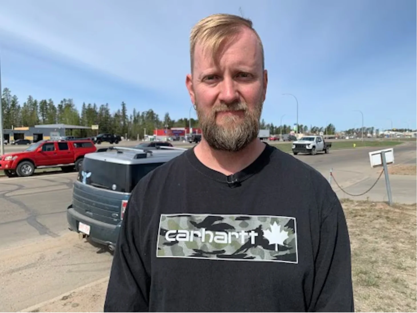 CBC: Dave Kusch, Woodlands County reeve, is seen here Tuesday morning in Whitecourt. He told CBC the fire moved quickly because of dry conditions. (Julia Wong/CBC)