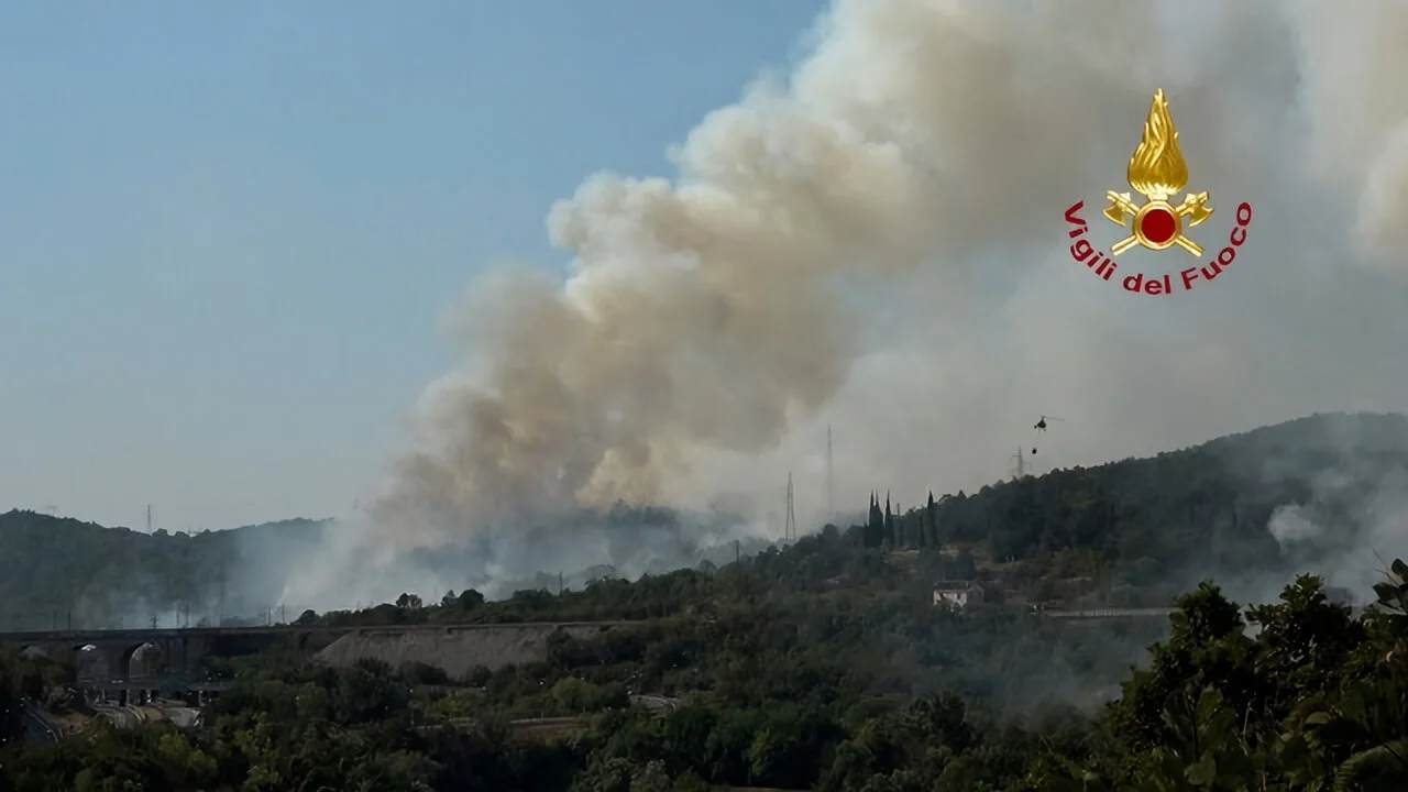 Firefighters battle wildfires in Duino, near Trieste, Italy, on July 20, 2022, in this screengrab taken from a video. (Vigili del Fuoco/ Handout via REUTERS)