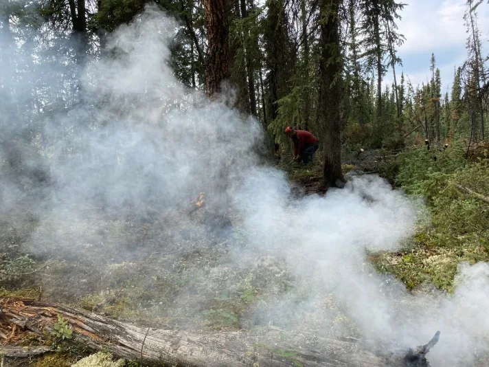 Firefighters have been working long days to control the spread of the Crystal Lake wildfire near Stewart Crossing. (Anna Desmarais/CBC)