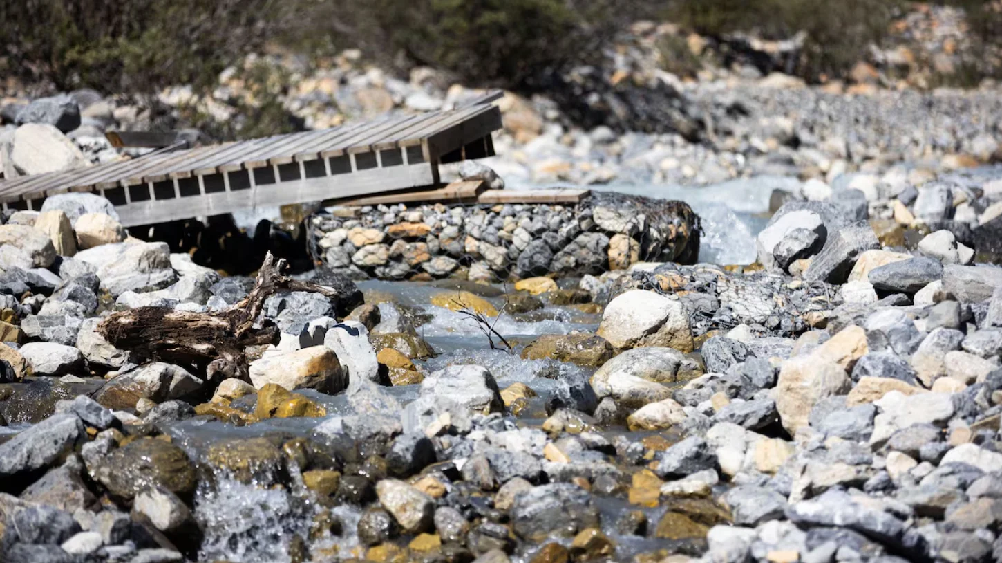 CBC: A bridge taken out by a flood at Berg Lake in Mount Robson Provincial Park is seen in August 2022, more than a year after a record-breaking heat wave meant hikers had to be evacuated from the area due to flooding. (Gian-Paolo Mendoza/CBC)