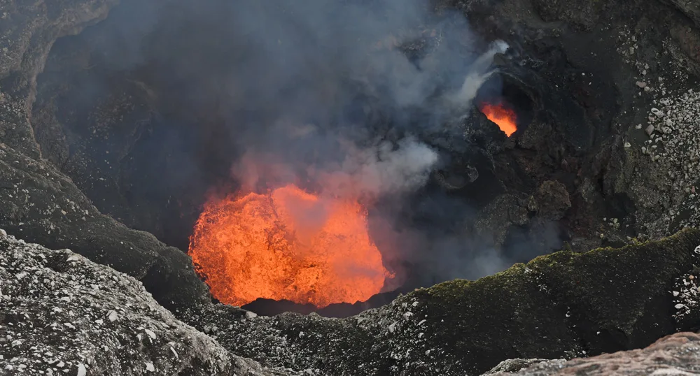 At the edge of a violent lava lake: Photos