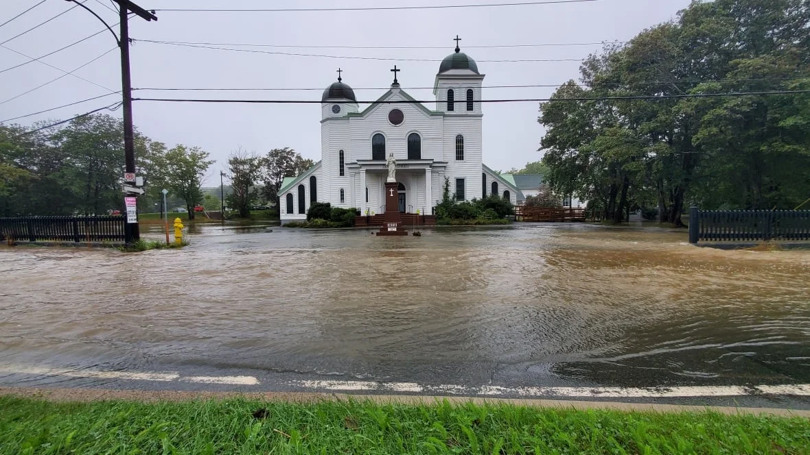 Heavy downpour overflowing riverbanks, flooding streets in St. John's area