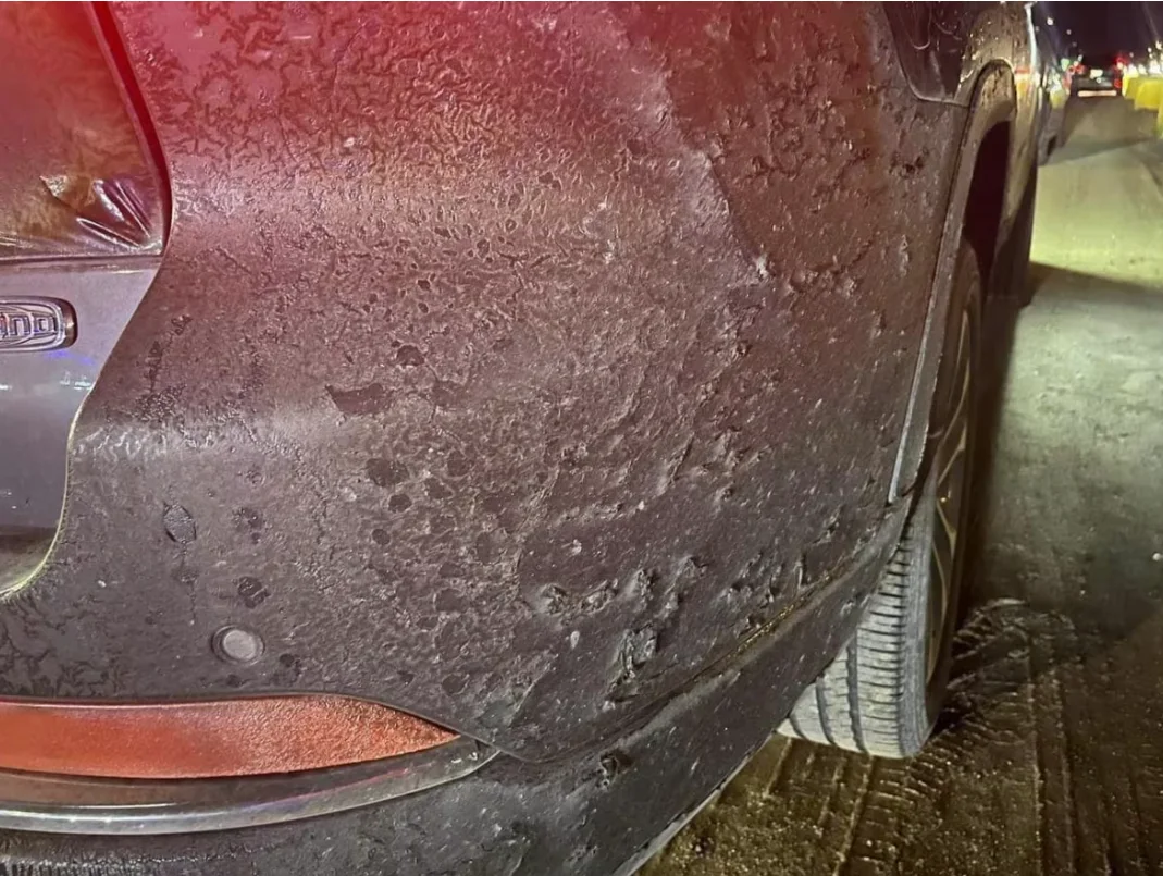 CBC: Lisa Mundy's bumper after evacuating from Hay River and driving along a highway near wildfire. (Submitted by Lisa Mundy)