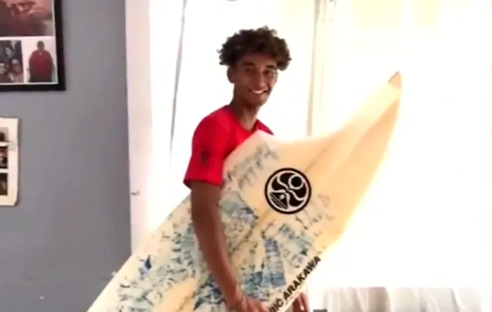 Shark takes a bite out of teen's surfboard