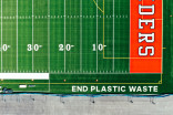Adidas builds football field using 1.8 million recycled plastic bottles