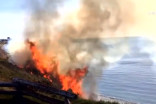 Large brush fire on Vancouver Island, woman hospitalized