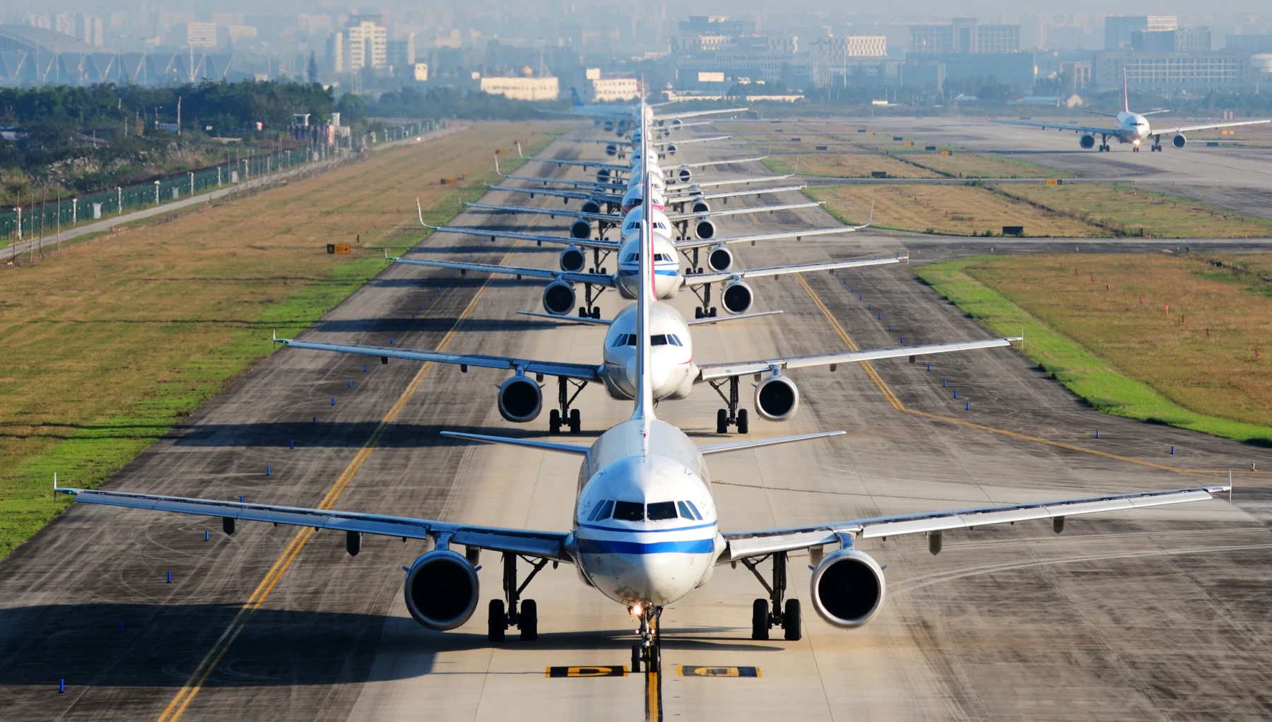 planes waiting for take off (Jingying Zhao/ Moment/ Getty Images)