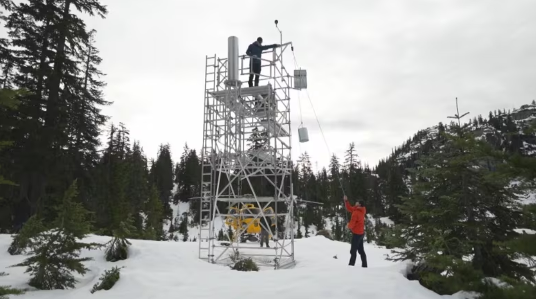 CBC: Metro Vancouver Regional District hydrologists take measurements of snow levels at a survey site at Palisade Lake in the Capilano watershed on Thursday. (CBC)
