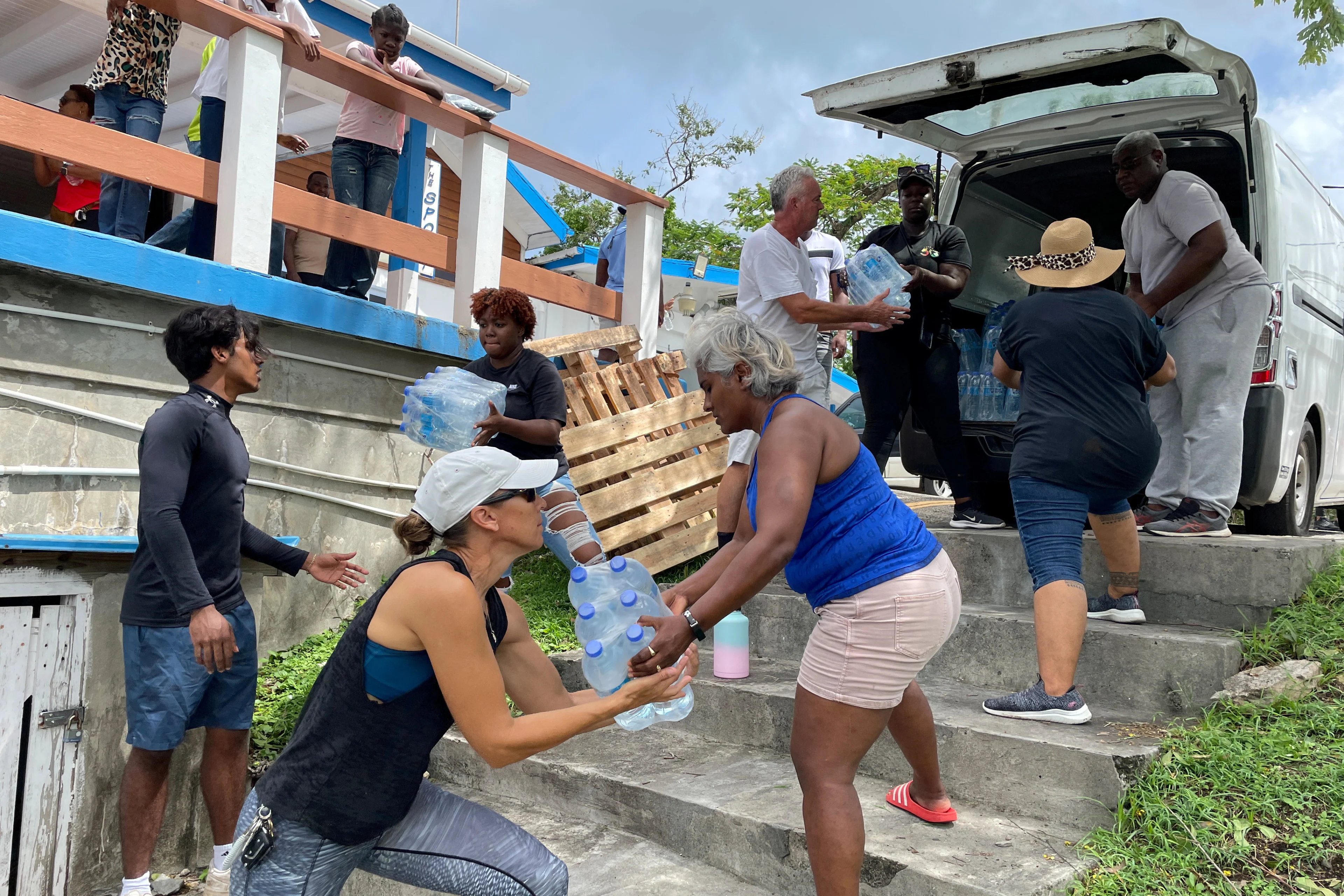 REUTERS: Essential supplies are being loaded onto a vessel at Grenada Yacht Club, destined for the island of Carriacou which was hit hard by Hurricane Beryl, in St. George's, Grenada July 2, 2024. REUTERS/Curlan Chrissey Campbell