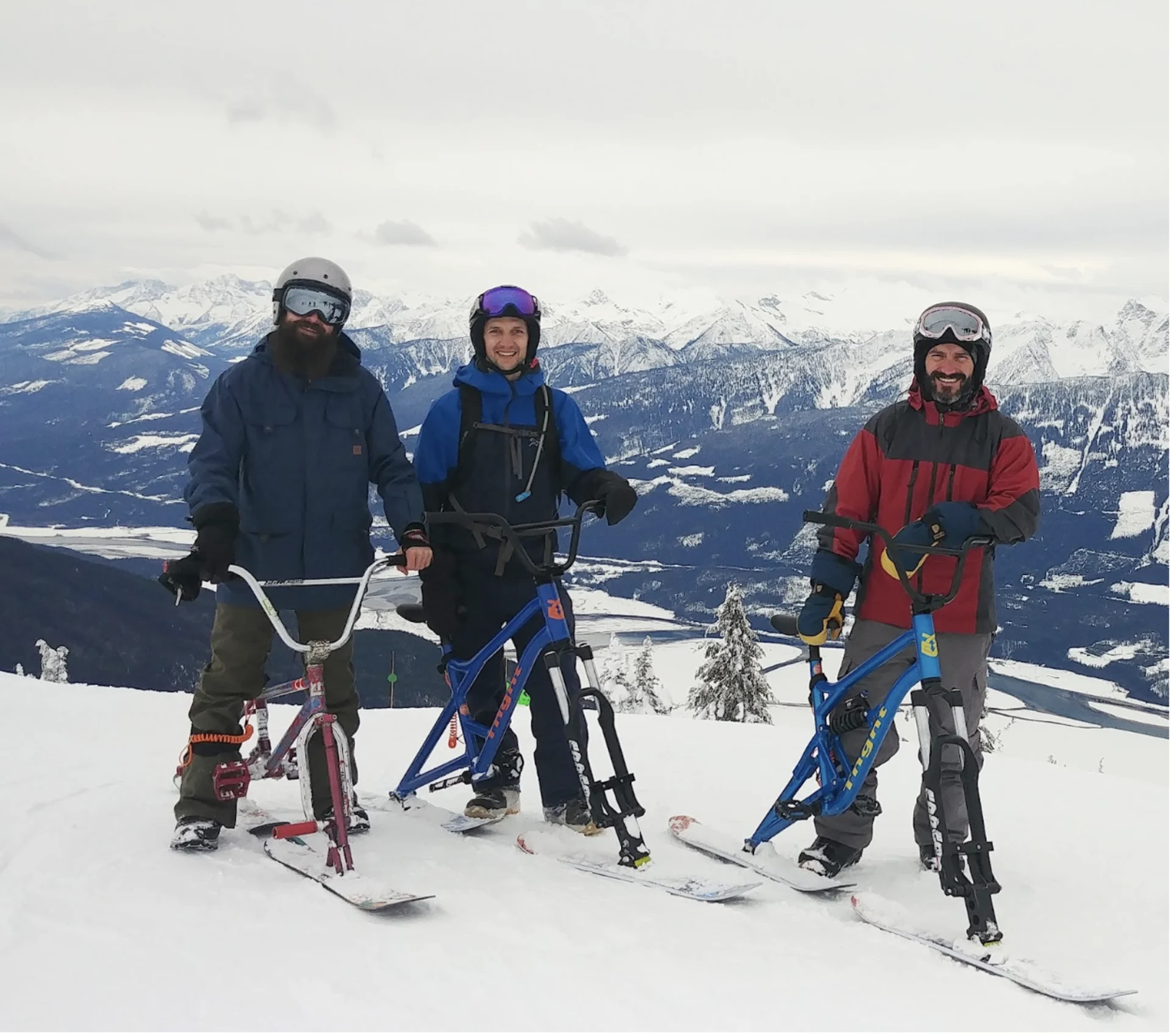 Facebook/Revelstoke Skibikes: Cyganik stands at the top of Revelstoke mountain with a pair of newly minted ski bikers.