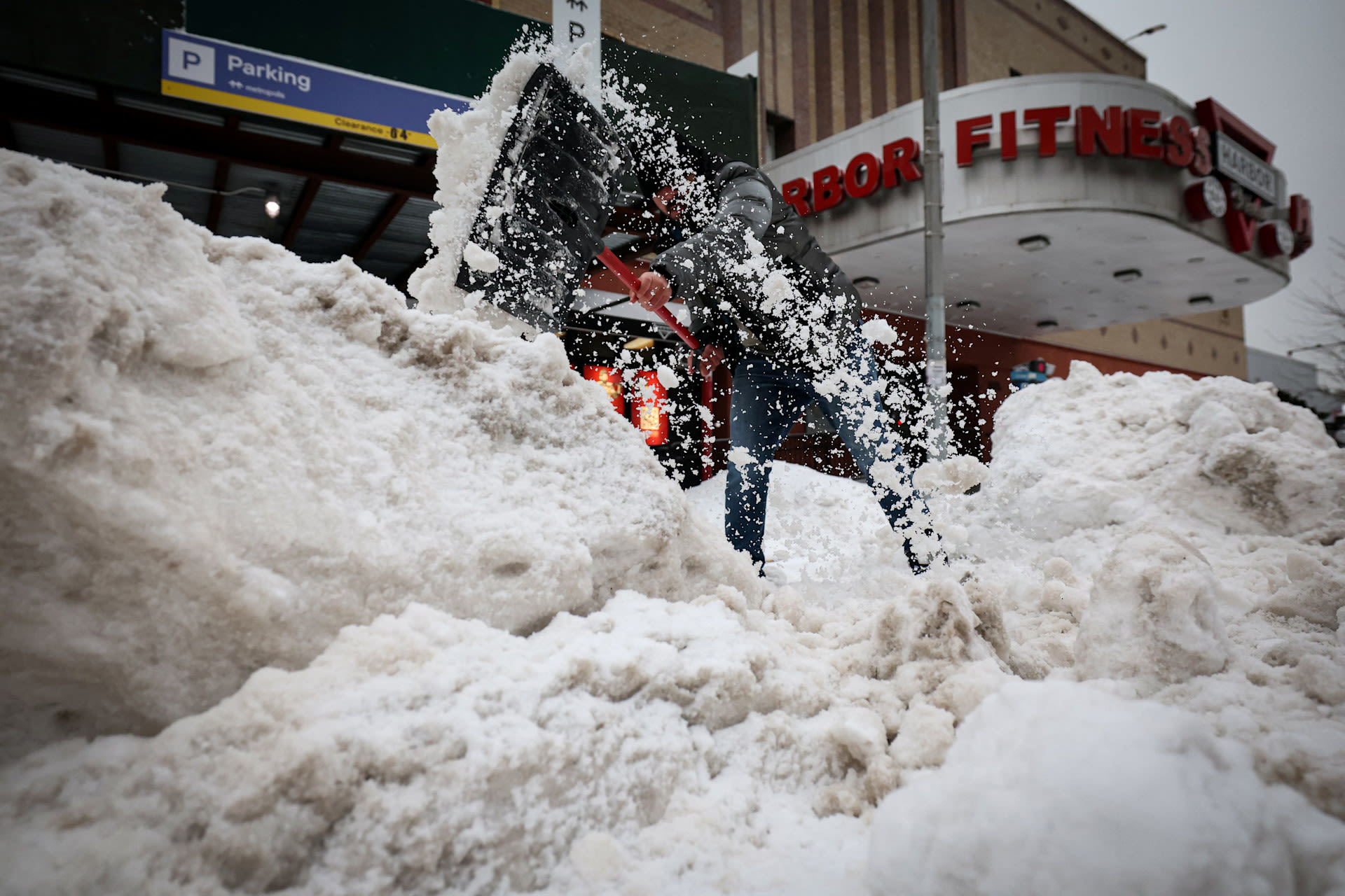 Millions of Americans digging out after monster storm, face days of bitter cold